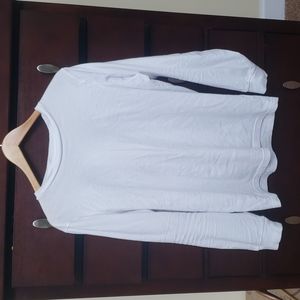 Worn white long sleeve shirt